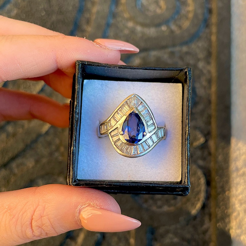 Sterling Silver Blue Topaz Ring with CZs